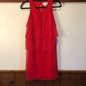 Jessica Simpson striking red dress